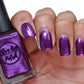 purple metallic nail polish swatch on pale skin tone