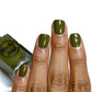 olive green nail polish swatch on medium skin tone