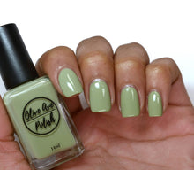 Load image into Gallery viewer, sage green nail polish swatch on medium skin tone