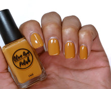 Load image into Gallery viewer, caramel nail polish swatch on medium skin tone