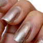 rose gold nail polish swatch on pale skin tone