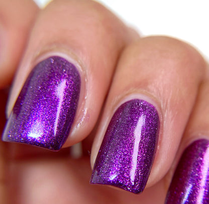 purple metallic nail polish swatch on pale skin tone