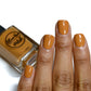 caramel nail polish swatch on medium skin tone