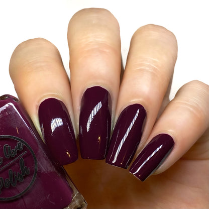 wine red nail polish swatch on pale skin tone