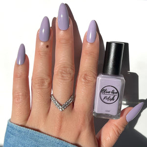 purple grey nail polish swatch on pale skin tone