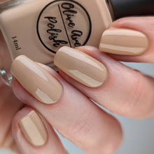 Load image into Gallery viewer, Tan nude nail polish swatch on pale skin tone