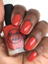 Load image into Gallery viewer, fall red nail polish swatch on medium dark skin tone