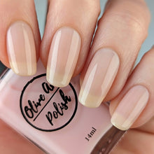 Load image into Gallery viewer, sheer pink nail polish swatch on pale skin tone