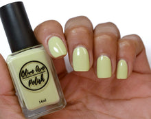Load image into Gallery viewer, light green nail polish swatch on medium skin tone