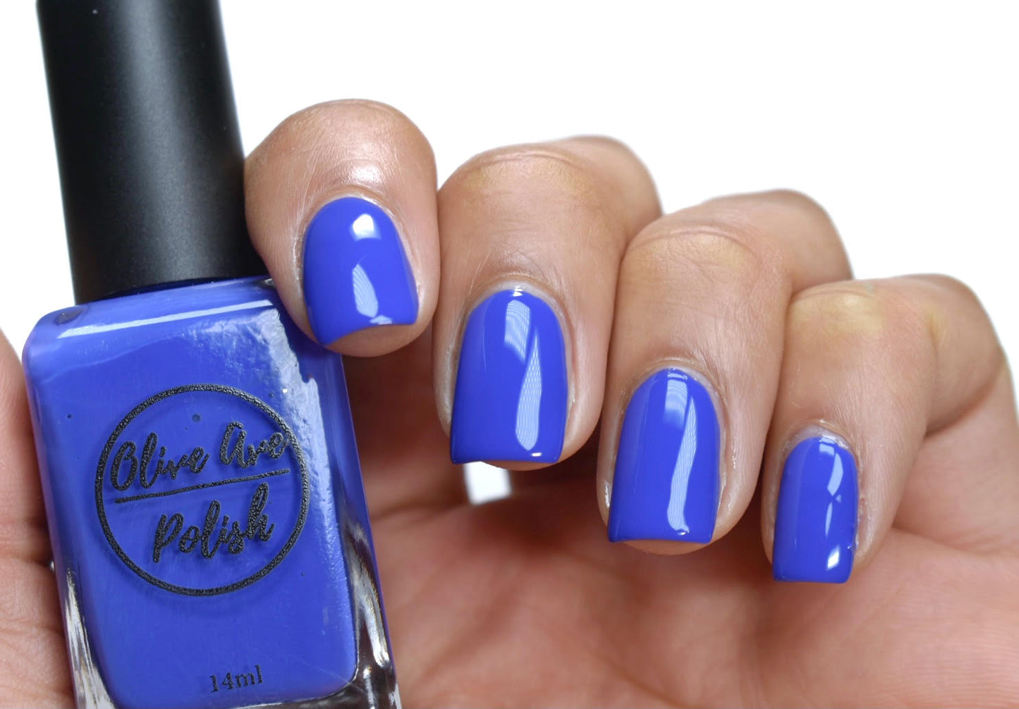 blue purple nail polish swatch on pale skin tone